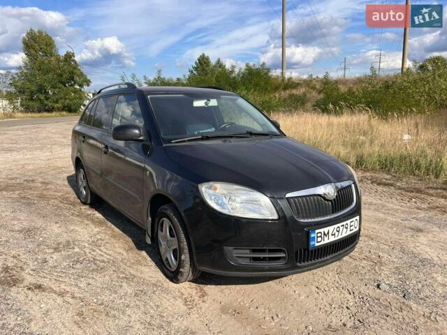 Черный Шкода Фабия, объемом двигателя 1.6 л и пробегом 204 тыс. км за 5700 $, фото 1 на Automoto.ua
