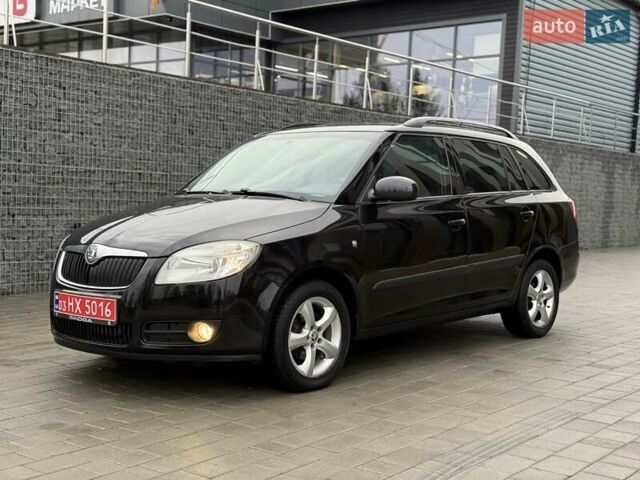Черный Шкода Фабия, объемом двигателя 1.39 л и пробегом 195 тыс. км за 5250 $, фото 1 на Automoto.ua