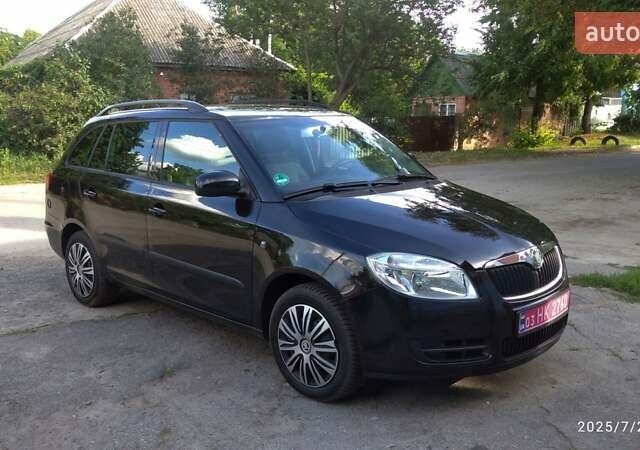 Черный Шкода Фабия, объемом двигателя 1.39 л и пробегом 204 тыс. км за 6200 $, фото 1 на Automoto.ua