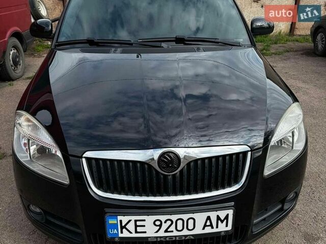 Черный Шкода Фабия, объемом двигателя 1.39 л и пробегом 214 тыс. км за 6500 $, фото 1 на Automoto.ua