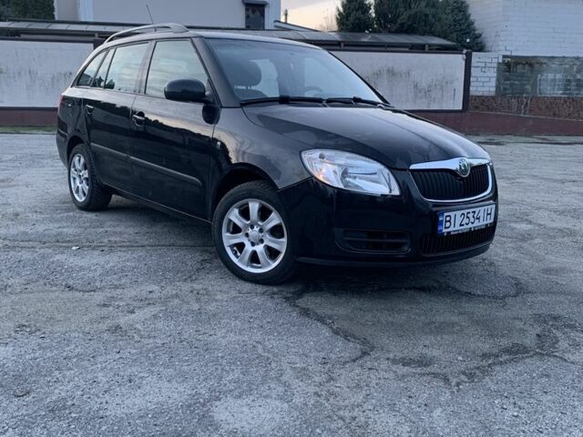 Черный Шкода Фабия, объемом двигателя 1.4 л и пробегом 228 тыс. км за 6999 $, фото 1 на Automoto.ua