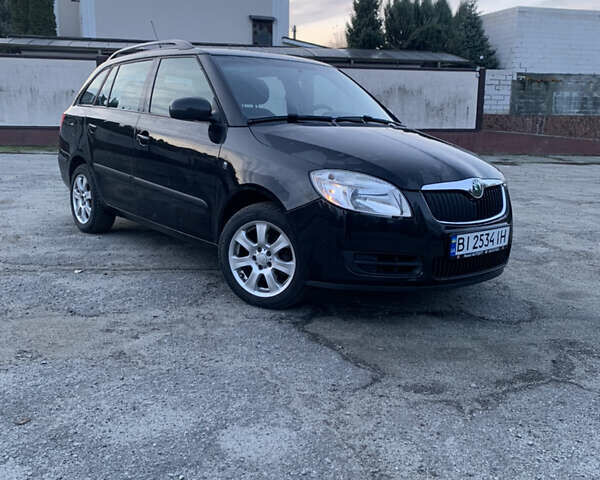 Черный Шкода Фабия, объемом двигателя 1.39 л и пробегом 230 тыс. км за 6999 $, фото 1 на Automoto.ua