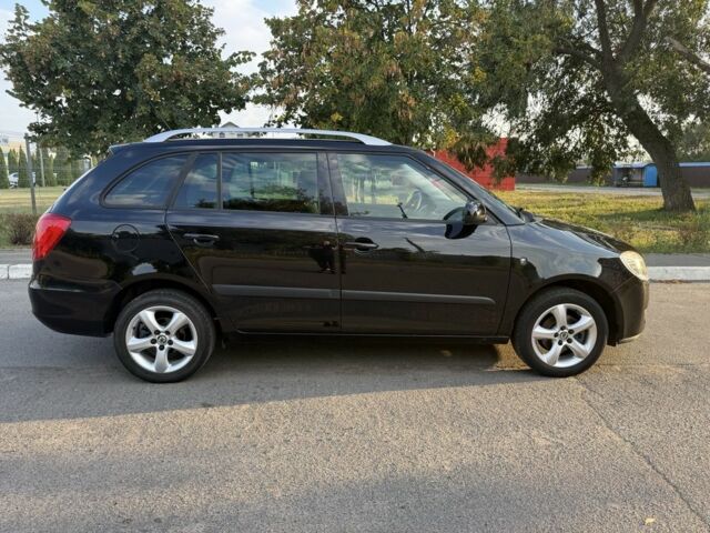 Чорний Шкода Фабія, об'ємом двигуна 1.4 л та пробігом 203 тис. км за 6304 $, фото 1 на Automoto.ua