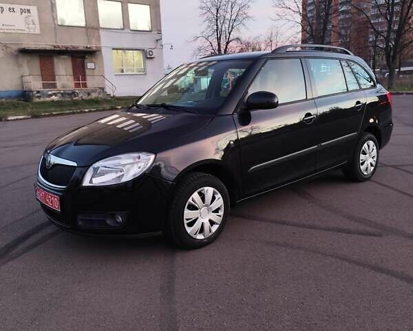 Черный Шкода Фабия, объемом двигателя 1.4 л и пробегом 197 тыс. км за 5800 $, фото 1 на Automoto.ua