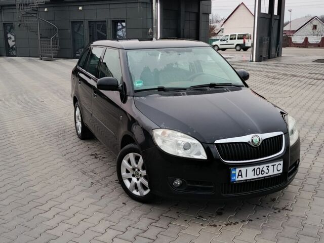 Черный Шкода Фабия, объемом двигателя 1.4 л и пробегом 200 тыс. км за 5200 $, фото 1 на Automoto.ua