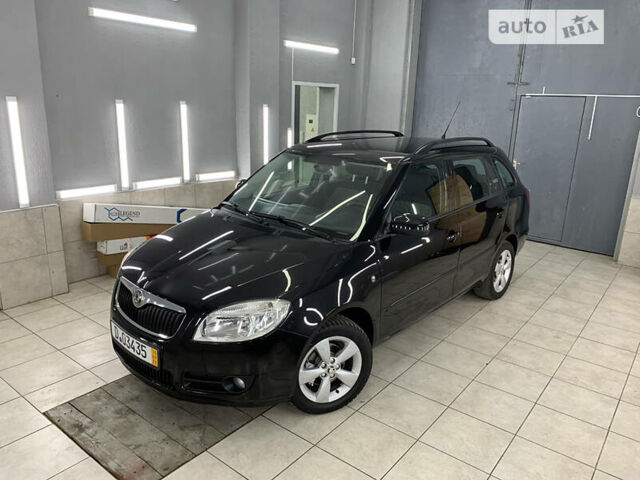 Черный Шкода Фабия, объемом двигателя 1.4 л и пробегом 185 тыс. км за 6300 $, фото 1 на Automoto.ua