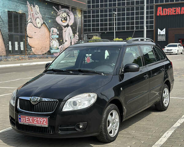 Черный Шкода Фабия, объемом двигателя 1.39 л и пробегом 225 тыс. км за 5650 $, фото 1 на Automoto.ua