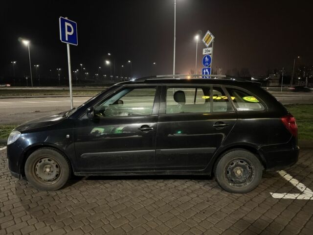 Черный Шкода Фабия, объемом двигателя 1.4 л и пробегом 326 тыс. км за 1650 $, фото 1 на Automoto.ua