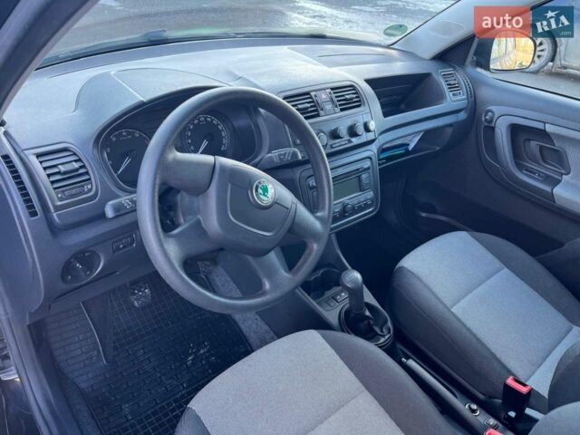 Черный Шкода Фабия, объемом двигателя 1.4 л и пробегом 178 тыс. км за 5700 $, фото 1 на Automoto.ua