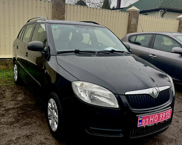 Черный Шкода Фабия, объемом двигателя 1.39 л и пробегом 201 тыс. км за 6300 $, фото 1 на Automoto.ua
