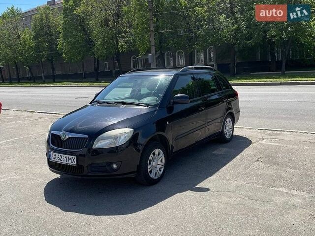 Черный Шкода Фабия, объемом двигателя 1.39 л и пробегом 220 тыс. км за 5900 $, фото 1 на Automoto.ua