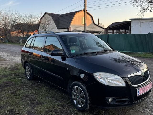 Черный Шкода Фабия, объемом двигателя 1.4 л и пробегом 235 тыс. км за 5500 $, фото 1 на Automoto.ua