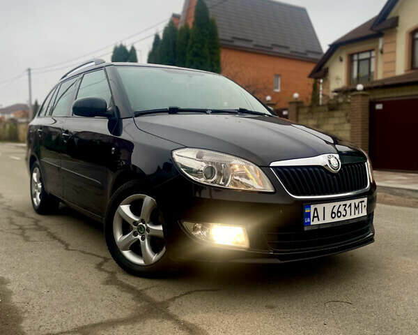 Черный Шкода Фабия, объемом двигателя 1.2 л и пробегом 243 тыс. км за 5300 $, фото 1 на Automoto.ua