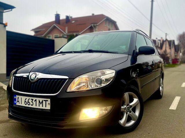 Черный Шкода Фабия, объемом двигателя 1.2 л и пробегом 243 тыс. км за 5300 $, фото 1 на Automoto.ua
