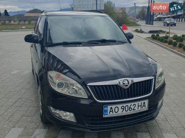 Черный Шкода Фабия, объемом двигателя 1.6 л и пробегом 208 тыс. км за 6300 $, фото 1 на Automoto.ua