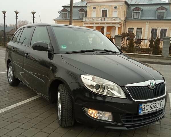 Черный Шкода Фабия, объемом двигателя 1.2 л и пробегом 190 тыс. км за 5700 $, фото 1 на Automoto.ua