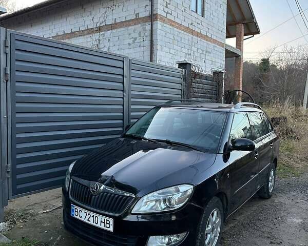 Черный Шкода Фабия, объемом двигателя 1.2 л и пробегом 295 тыс. км за 4900 $, фото 1 на Automoto.ua