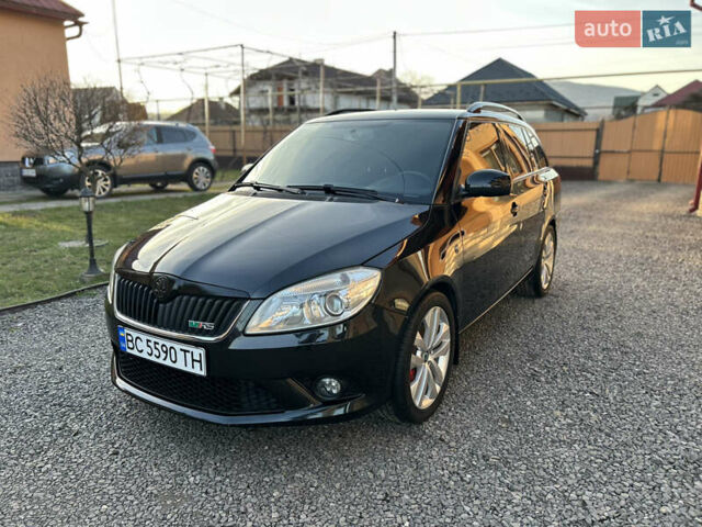 Черный Шкода Фабия, объемом двигателя 1.4 л и пробегом 205 тыс. км за 7650 $, фото 1 на Automoto.ua