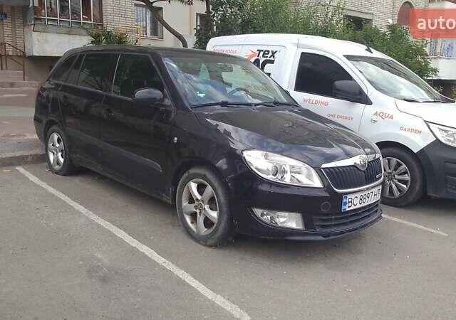 Черный Шкода Фабия, объемом двигателя 1.2 л и пробегом 200 тыс. км за 6000 $, фото 1 на Automoto.ua