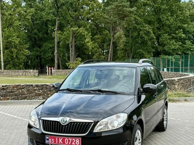 Чорний Шкода Фабія, об'ємом двигуна 1.4 л та пробігом 196 тис. км за 6199 $, фото 1 на Automoto.ua