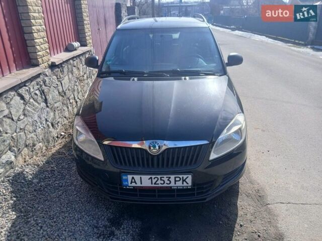 Черный Шкода Фабия, объемом двигателя 1.6 л и пробегом 270 тыс. км за 5650 $, фото 1 на Automoto.ua