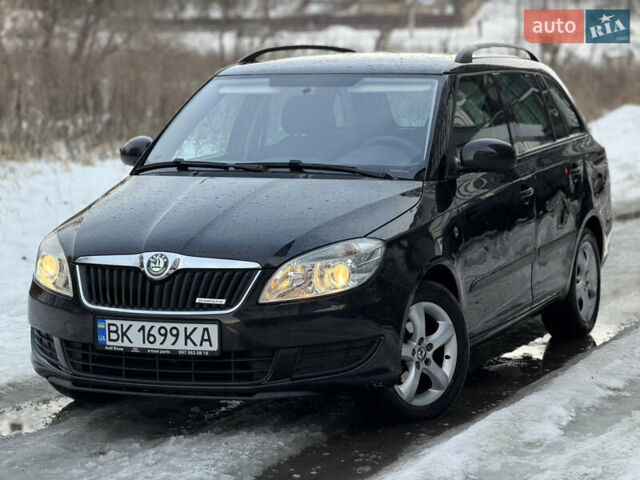 Черный Шкода Фабия, объемом двигателя 1.2 л и пробегом 219 тыс. км за 4950 $, фото 1 на Automoto.ua