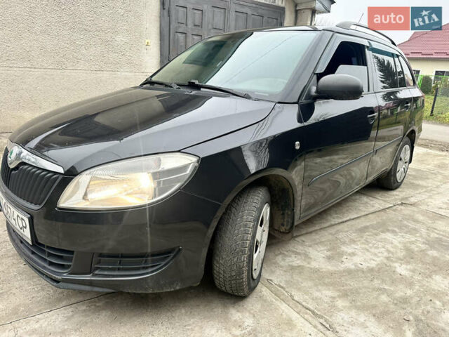Черный Шкода Фабия, объемом двигателя 1.6 л и пробегом 278 тыс. км за 5300 $, фото 1 на Automoto.ua