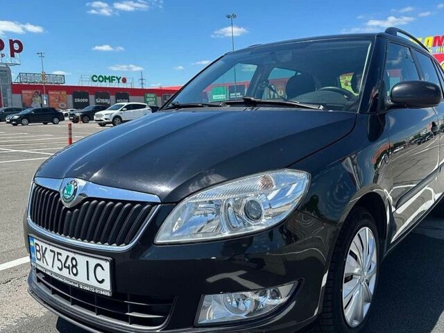 Чорний Шкода Фабія, об'ємом двигуна 1.2 л та пробігом 212 тис. км за 5500 $, фото 1 на Automoto.ua