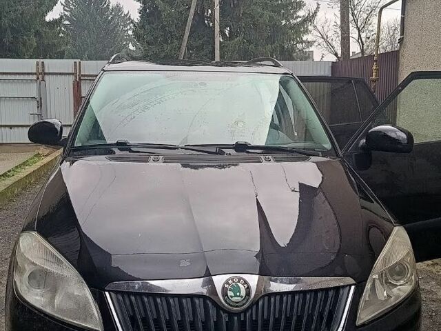 Черный Шкода Фабия, объемом двигателя 1.2 л и пробегом 200 тыс. км за 5300 $, фото 1 на Automoto.ua