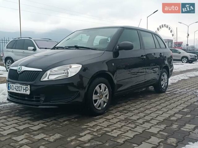 Черный Шкода Фабия, объемом двигателя 1.2 л и пробегом 198 тыс. км за 5800 $, фото 1 на Automoto.ua