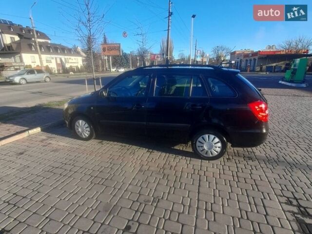 Черный Шкода Фабия, объемом двигателя 1.2 л и пробегом 232 тыс. км за 4499 $, фото 1 на Automoto.ua