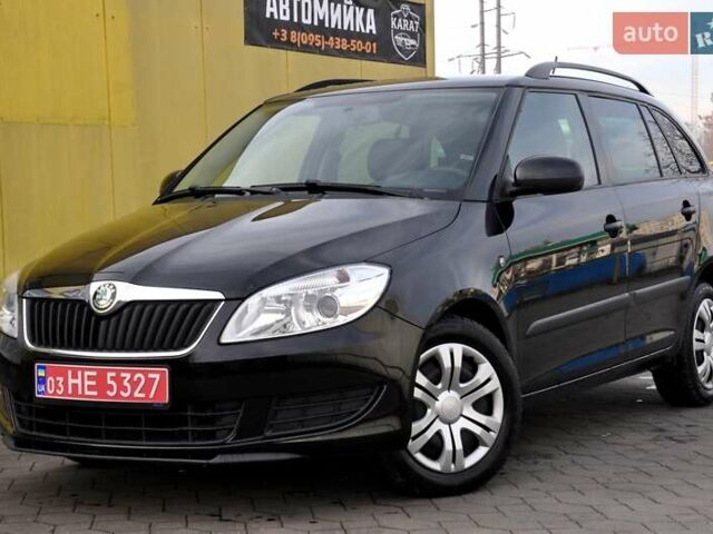 Черный Шкода Фабия, объемом двигателя 1.2 л и пробегом 196 тыс. км за 5700 $, фото 1 на Automoto.ua