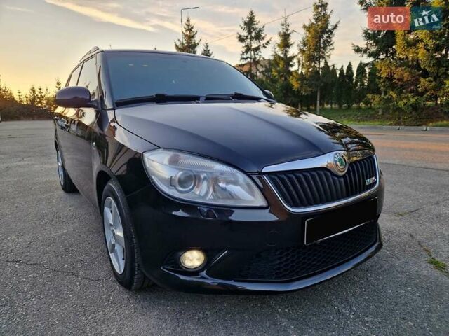 Черный Шкода Фабия, объемом двигателя 1.4 л и пробегом 225 тыс. км за 8600 $, фото 1 на Automoto.ua