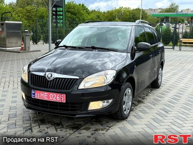Черный Шкода Фабия, объемом двигателя 1.4 л и пробегом 190 тыс. км за 6800 $, фото 1 на Automoto.ua