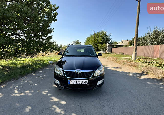 Черный Шкода Фабия, объемом двигателя 1.2 л и пробегом 266 тыс. км за 5600 $, фото 1 на Automoto.ua