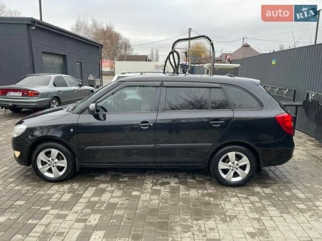 Черный Шкода Фабия, объемом двигателя 1.2 л и пробегом 257 тыс. км за 5400 $, фото 1 на Automoto.ua