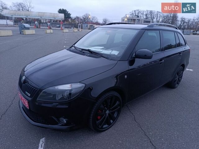 Черный Шкода Фабия, объемом двигателя 1.4 л и пробегом 203 тыс. км за 10900 $, фото 1 на Automoto.ua