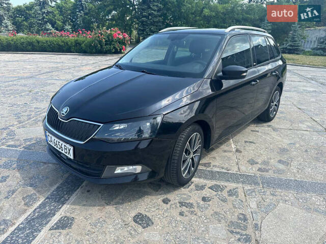 Черный Шкода Фабия, объемом двигателя 1.4 л и пробегом 293 тыс. км за 8200 $, фото 1 на Automoto.ua