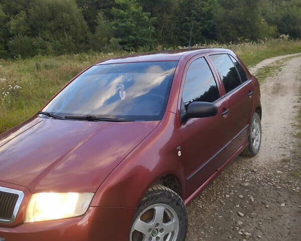 Красный Шкода Фабия, объемом двигателя 1.4 л и пробегом 120 тыс. км за 3900 $, фото 1 на Automoto.ua
