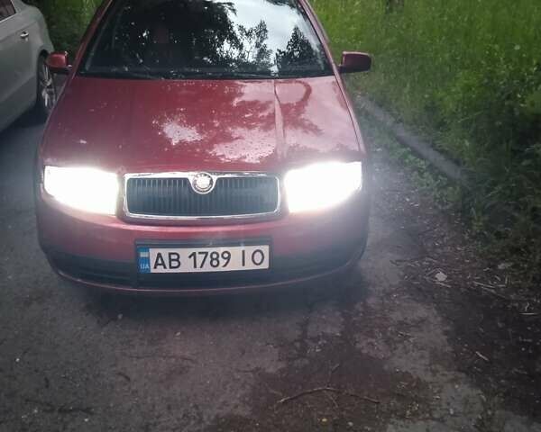 Красный Шкода Фабия, объемом двигателя 1.39 л и пробегом 226 тыс. км за 5400 $, фото 1 на Automoto.ua