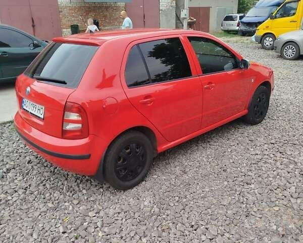 Красный Шкода Фабия, объемом двигателя 1.2 л и пробегом 295 тыс. км за 3000 $, фото 1 на Automoto.ua