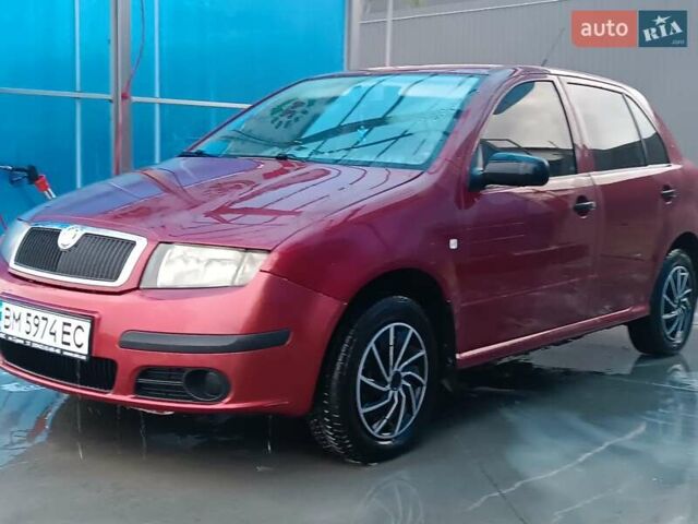 Красный Шкода Фабия, объемом двигателя 1.2 л и пробегом 179 тыс. км за 2950 $, фото 1 на Automoto.ua