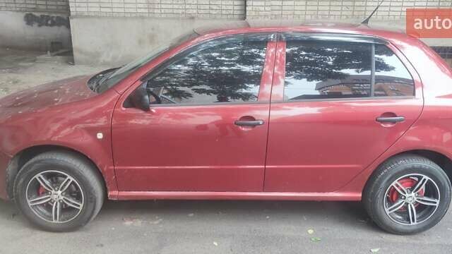 Шкода Фабия 2006 в Днепре (Днепропетровске) на Automoto.ua Красный Шкода Фабия, объемом двигателя 1.2 л и пробегом 255 тыс. км за 3500 $, фото 1 на Automoto.ua