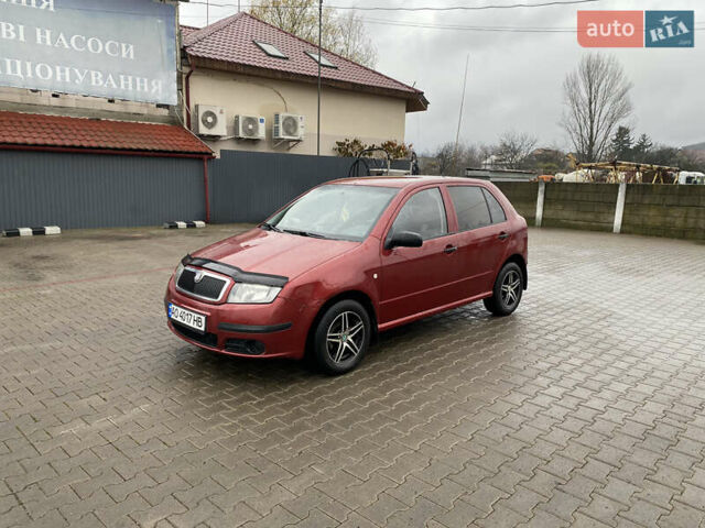 Красный Шкода Фабия, объемом двигателя 1.2 л и пробегом 189 тыс. км за 2999 $, фото 1 на Automoto.ua