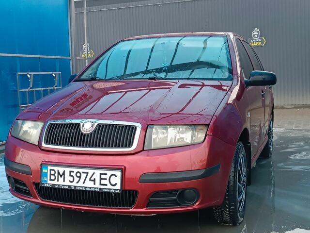 Красный Шкода Фабия, объемом двигателя 1.2 л и пробегом 180 тыс. км за 2950 $, фото 1 на Automoto.ua