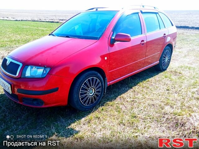 Красный Шкода Фабия, объемом двигателя 1.4 л и пробегом 245 тыс. км за 3100 $, фото 1 на Automoto.ua
