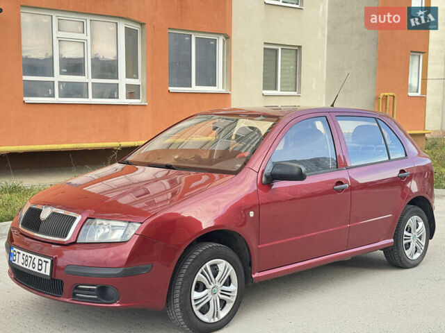 Красный Шкода Фабия, объемом двигателя 1.2 л и пробегом 155 тыс. км за 3499 $, фото 1 на Automoto.ua