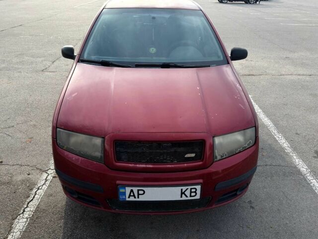 Красный Шкода Фабия, объемом двигателя 1.2 л и пробегом 283 тыс. км за 3700 $, фото 1 на Automoto.ua
