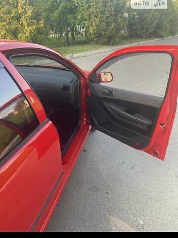 Красный Шкода Фабия, объемом двигателя 1.2 л и пробегом 182 тыс. км за 3900 $, фото 1 на Automoto.ua