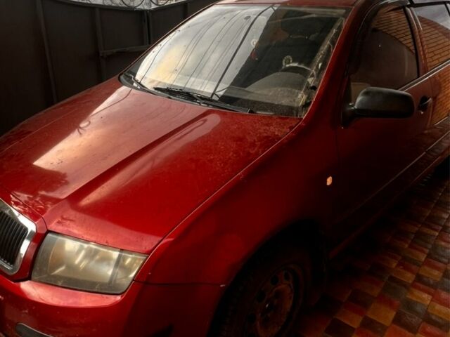 Красный Шкода Фабия, объемом двигателя 1.2 л и пробегом 158 тыс. км за 3600 $, фото 1 на Automoto.ua